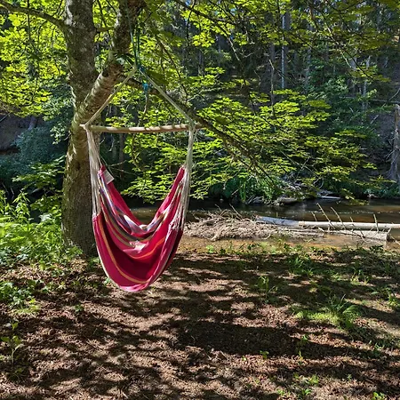 Charming Garden House By The River Lodge