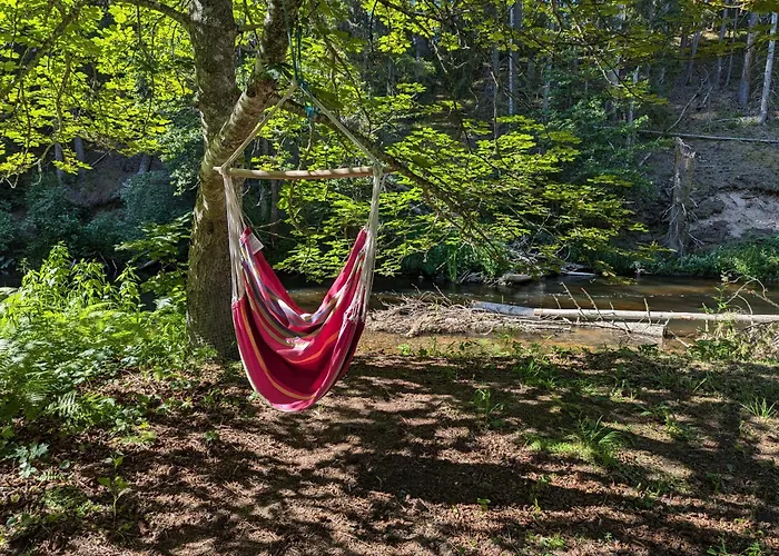 Charming Garden House By The River Lodge